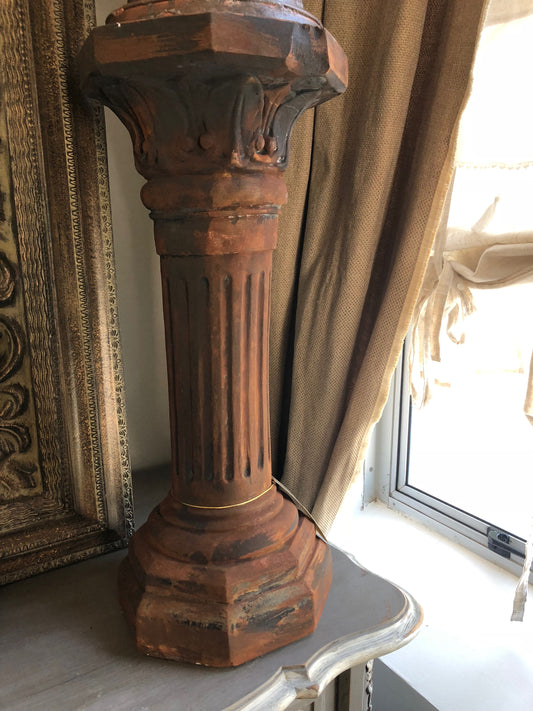 Pillar with antique rust finish