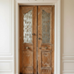 Antique Oak Doors with Iron Scroll Work