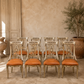 Set of Eight Italian Neoclassical Cognac Leather Dining Chairs