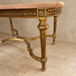 French Louis XVI Style Gilt Coffee Table with Peach Marble