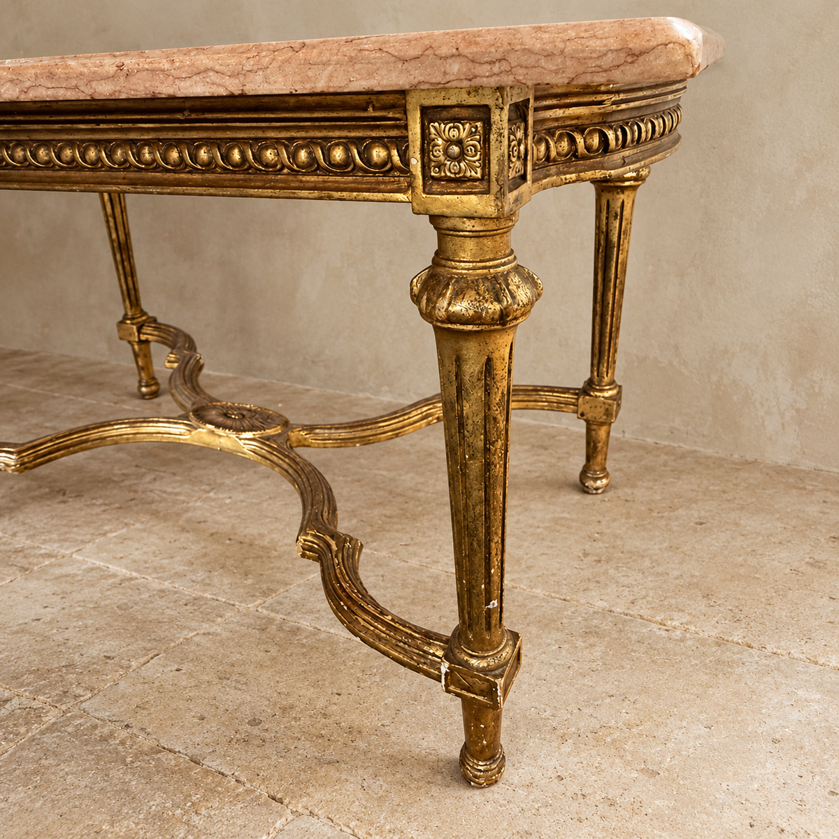French Louis XVI Style Gilt Coffee Table with Peach Marble